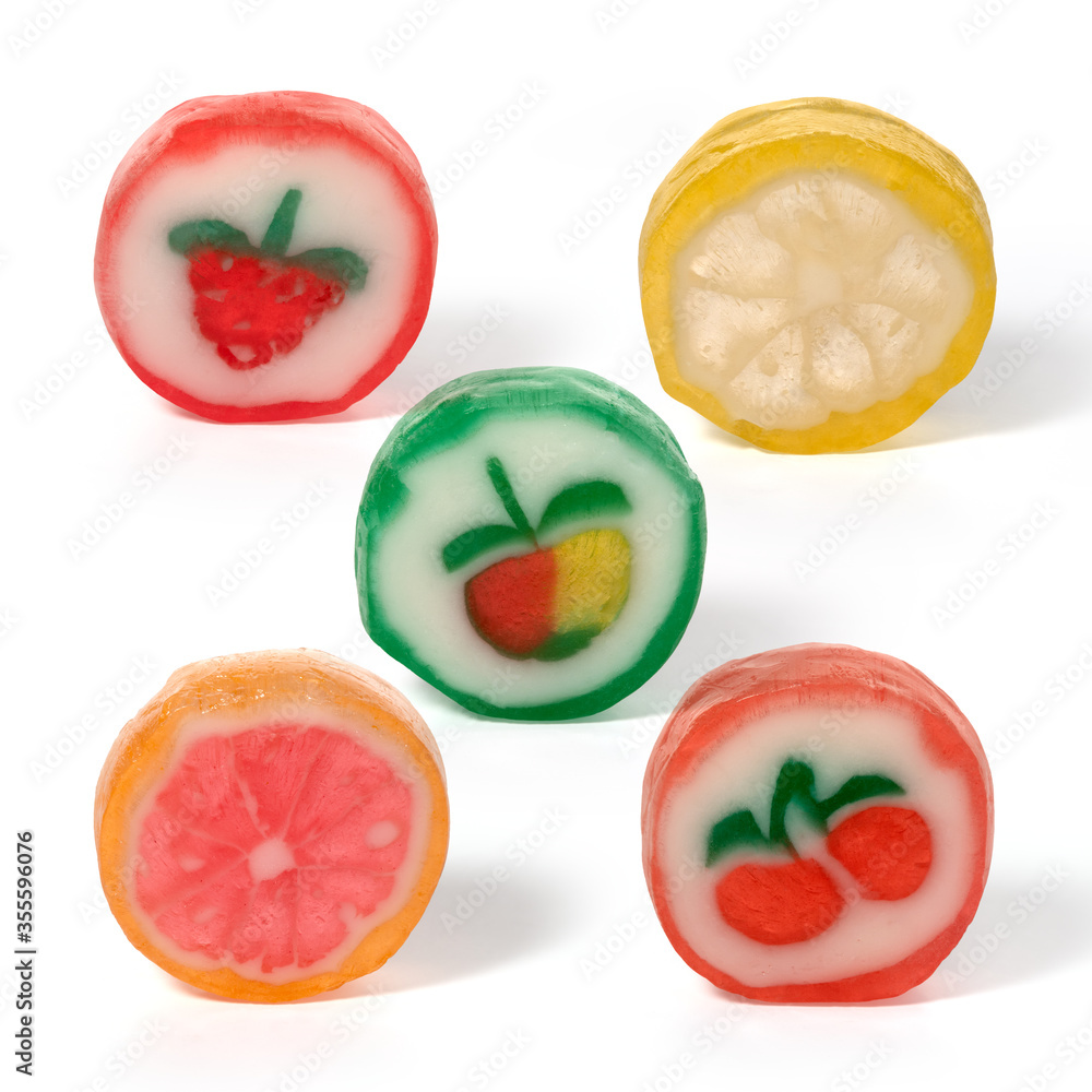 Five round fruit caramels on a white background Five round fruit caramels on a white background