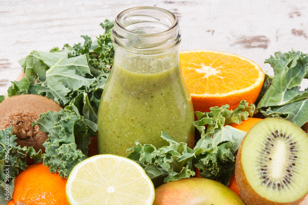 Healthy smoothie from fruits and vegetables containing minerals. Dieting and slimming concept Healthy smoothie from fruits and vegetables containing minerals. Dieting and slimming concept