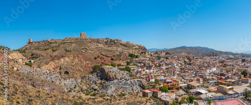 Castle in lorca overlooking the town, Spain photo