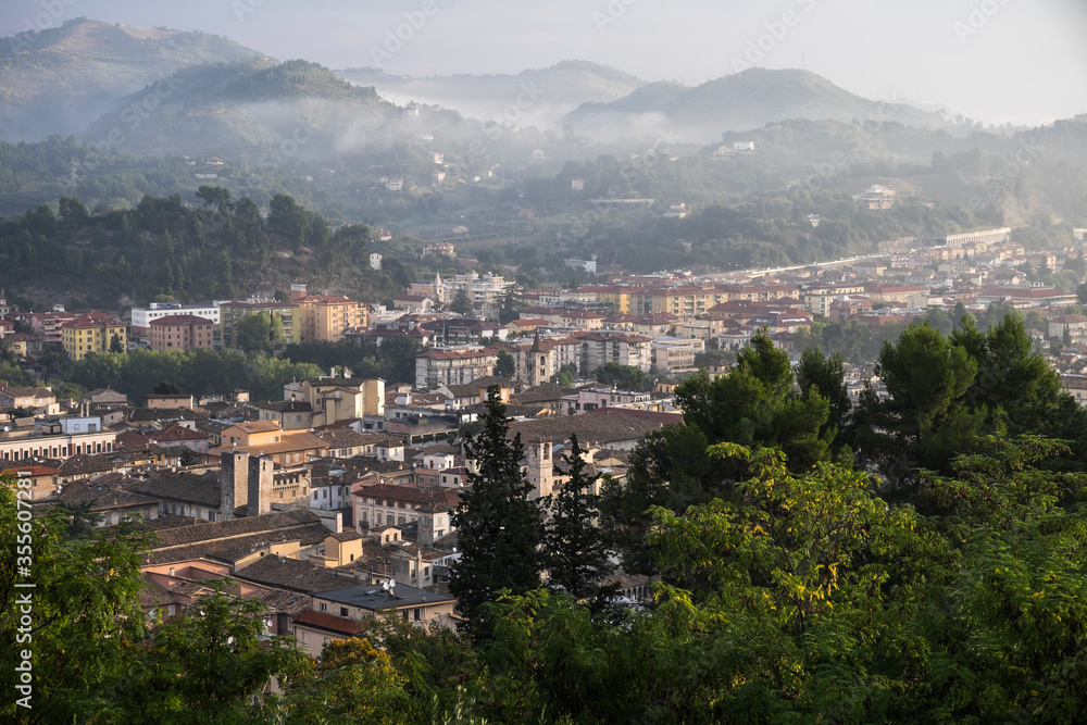 Panoramic view on Ascoli Piceno (Marche, Italy) in early morning with mist in the hills