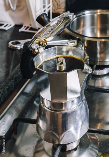 Moka coffee pot on a gas stove (Selective focus)