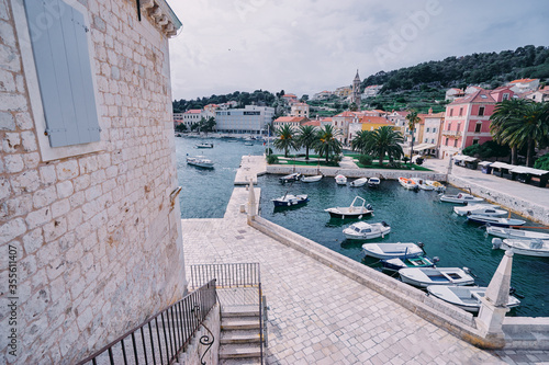 Fototapeta Naklejka Na Ścianę i Meble -  Hvar Old Town Promenade. Sea coast in Dalmatia,Croatia. A famous tourist destination on the Adriatic sea. Old town and marina.
