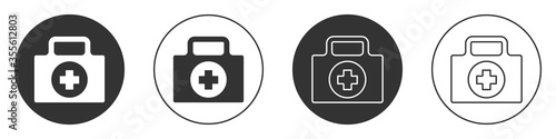 Black First aid kit icon isolated on white background. Medical box with cross. Medical equipment for emergency. Healthcare concept. Circle button. Vector Illustration.