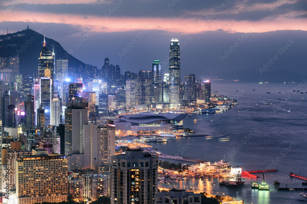 Fototapeta premium Fabulous aerial view of skyscrapers in Hong Kong at sunset