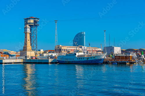 View of the port of Barcelona with Torre del Rellotge tower, Spain photo