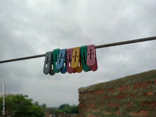 Photography Close up of some cloth hanging clips Stock Photo
