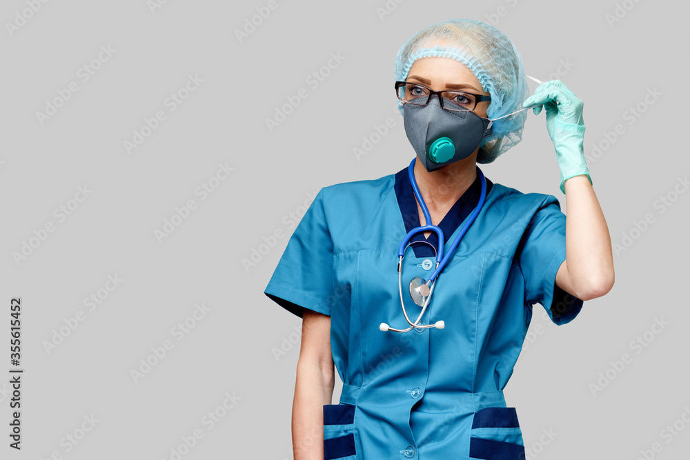 female doctor with stethoscope wearing protective mask and latex gloves over light grey background female doctor with stethoscope wearing protective mask and latex gloves over light grey background