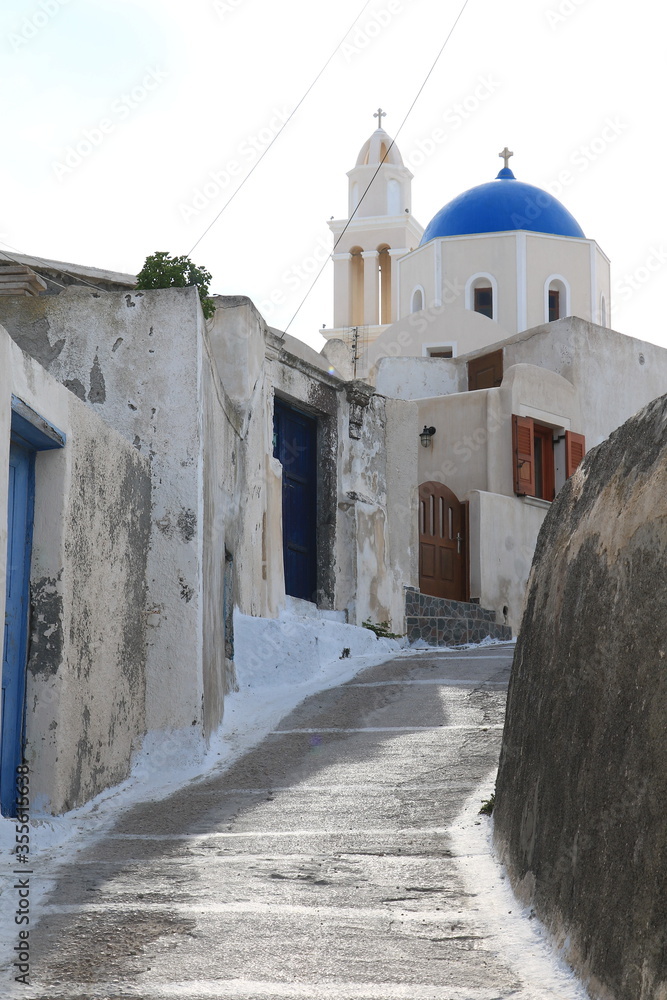 Old street in Akrotiri village on Santorini island, Greece