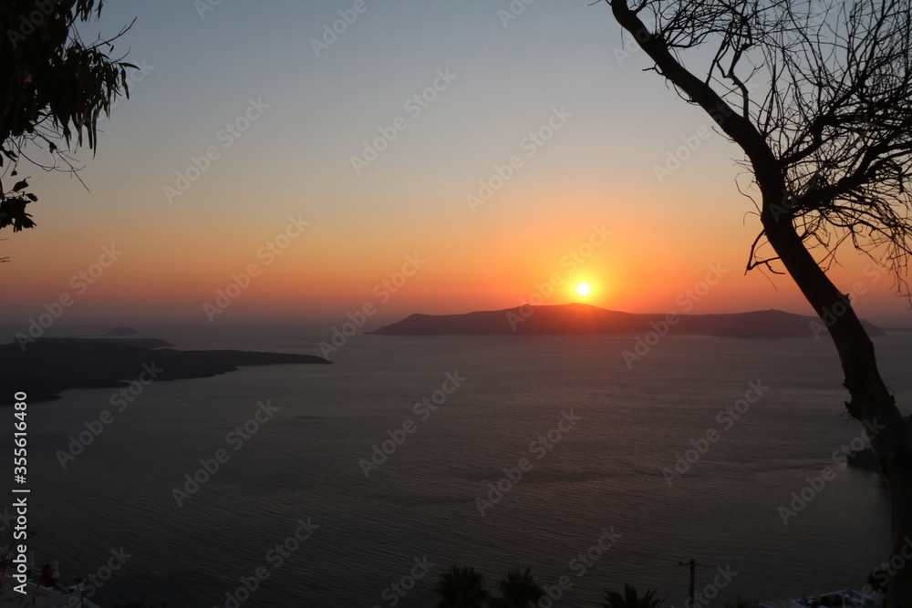 Summer sunset in Santorini island in Greece Summer sunset in Santorini island in Greece