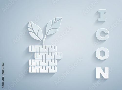 Paper cut Dollar plant icon isolated on grey background. Business investment growth concept. Money savings and investment. Paper art style. Vector Illustration.