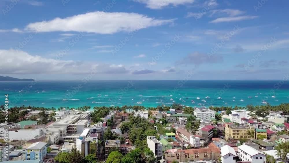 Boracay Coastline with Blue and White Sailing Boats on the Sea in a Sunny Day, The Philippines, Southeast Asia.