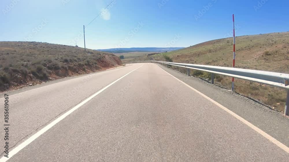 SO-160 winding paved road next to Retortillo de Soria, province of Soria, Castilla y Leon, Spain SO-160 winding paved road next to Retortillo de Soria, province of Soria, Castilla y Leon, Spain