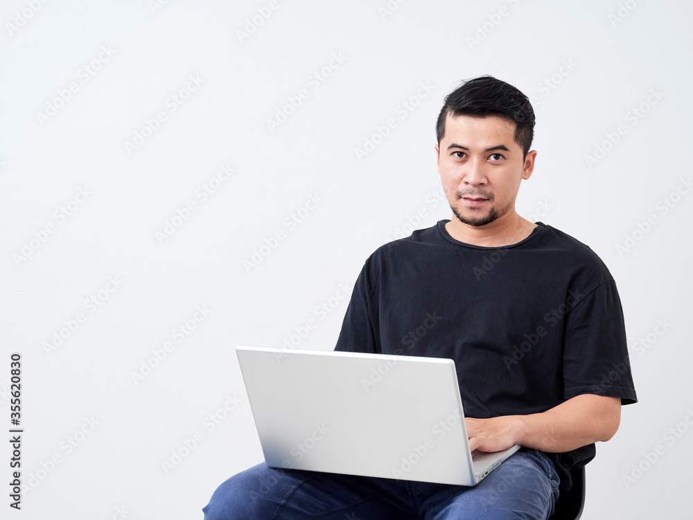Young man sitting work with laptop. Young man sitting work with laptop.