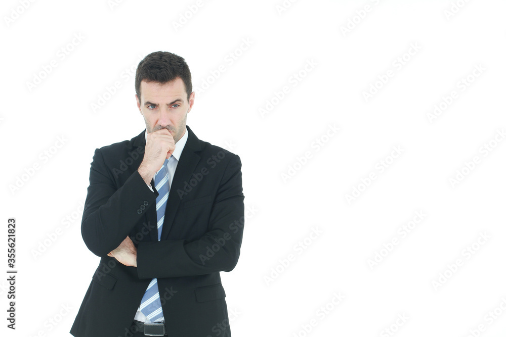 Successful and handsome businessman in a suit serious and hard thinking in working isolated on white background. Copy space Successful and handsome businessman in a suit serious and hard thinking in working isolated on white background. Copy space