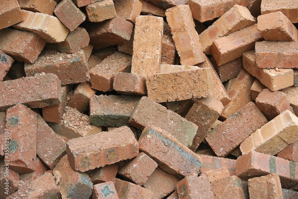 Pile of red clay brick at the construction site. Pile of red clay brick at the construction site.