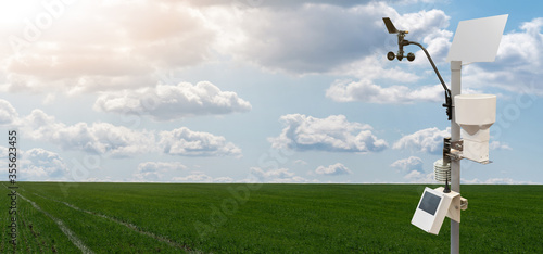 Obraz na plátně Weather station in a wheat field. Precision farming equipment
