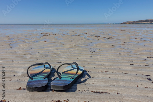 A Pair of Flip Flops on a Deserted Beach in Australia
