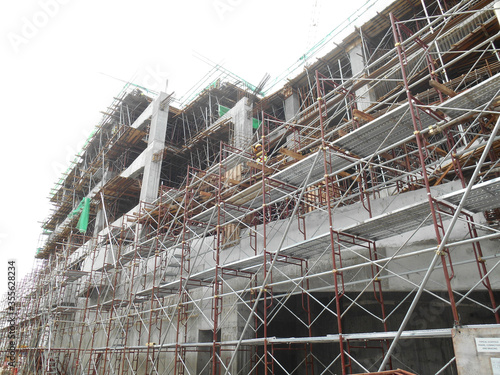 KUALA LUMPUR, MALAYSIA -SEPTEMBER 19, 2016: Building under construction. Facade wall and treatment yet finish.  photo