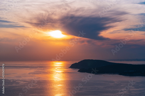 View of Heybeliada and Burgazada at sunset. Heybeliada is the second largest of the Prince Islands (Adalar) in the Sea of Marmara, near Istanbul, Turkey.