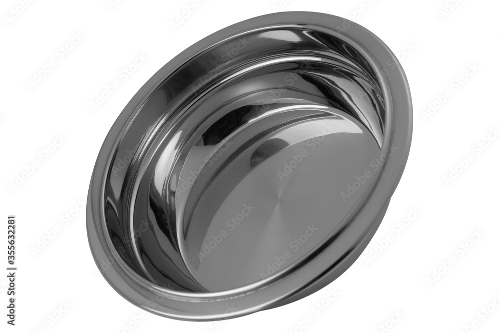 shiny stainless steel bowl, as if flying, on a white background, modern dishes