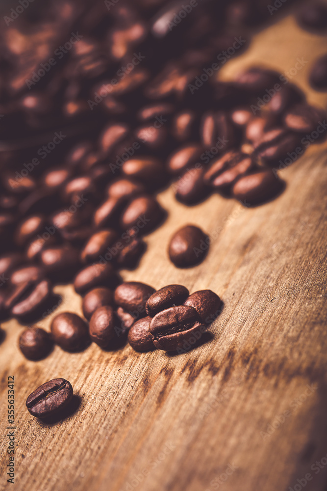 Coffee beans on wooden table