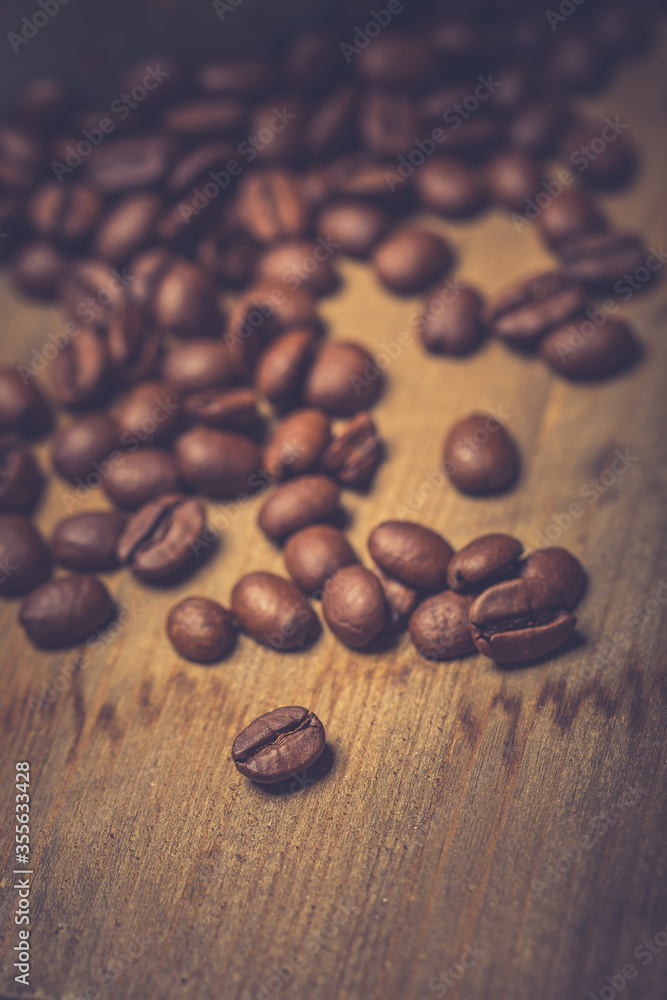 Coffee beans on wooden table