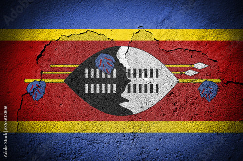 Swaziland flag on cracked wall