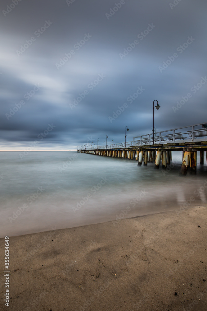 Stormy sunrise over the baltic sea in Gdynia Orlowo, Poland