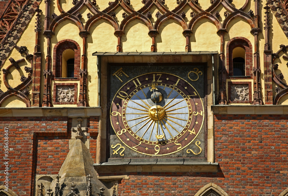 Clock at townhouse in Wroclaw. Poland