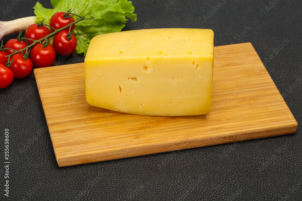 Hard yellow tasty cheese brick Hard yellow tasty cheese brick
