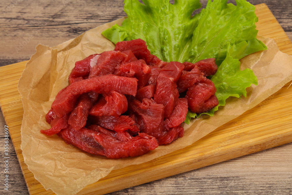 Raw beef meat sliced for cooking Raw beef meat sliced for cooking