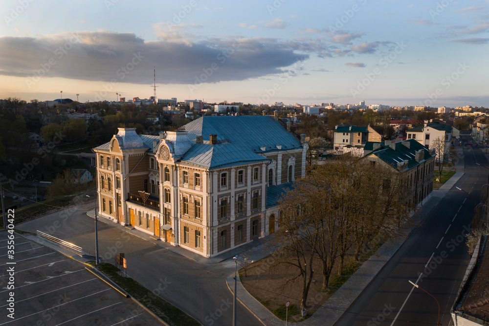 Beautiful eclectic synagogue in the city center in the evening, aerial photography