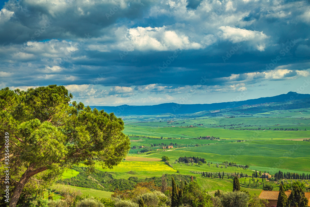 View from Pienza town at surrounding countryside of the Val d'Orcia valley in Tuscany, Italy, Europe.