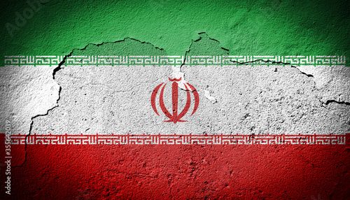 Iran flag on cracked wall