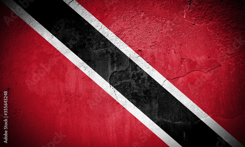 Trinidad and Tobago flag on cracked wall