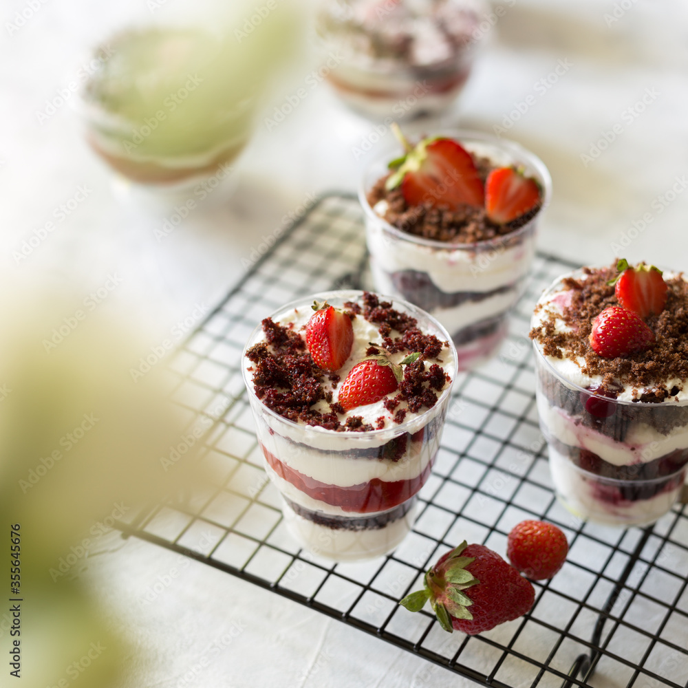Strawberry trifle dessert on the black lattice. Strawberry trifle dessert on the black lattice.