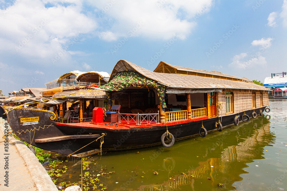Obraz premium Panorama of tourist houseboat on Kerala backwaters. Kerala, India
