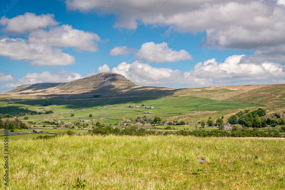 A summer, three image HDR of Pen-y-gent, Penyghent, one of the three peaks in the Yorkshire Dales National Park