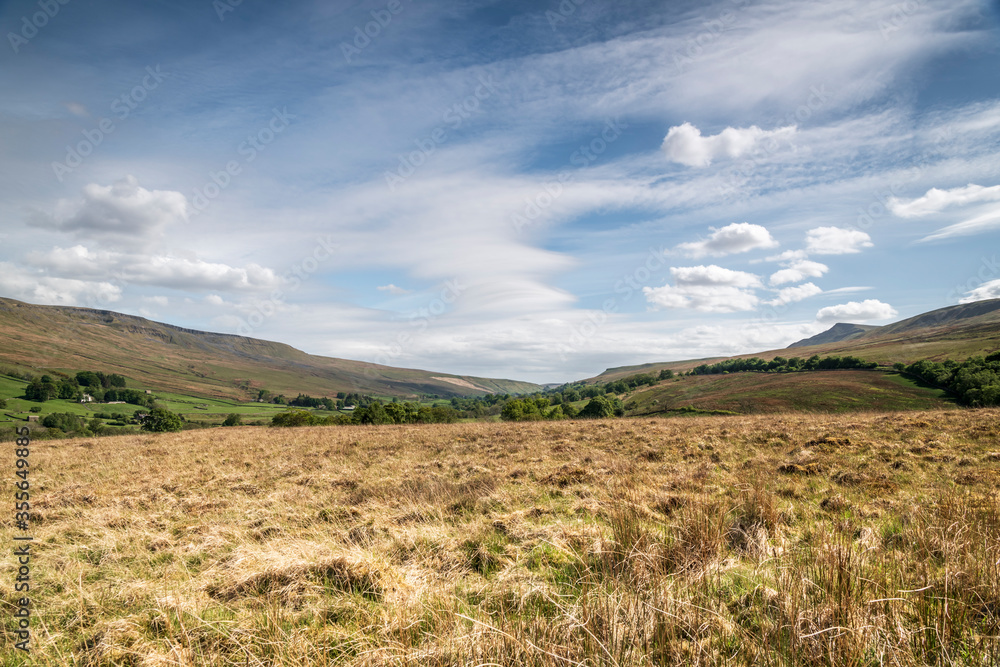 A summer three images HDR picture of Wild Boar Fell, in the Yorkshire Dales National Park, taken from Wharton Fell in Cumbria A summer three images HDR picture of Wild Boar Fell, in the Yorkshire Dales National Park, taken from Wharton Fell in Cumbria