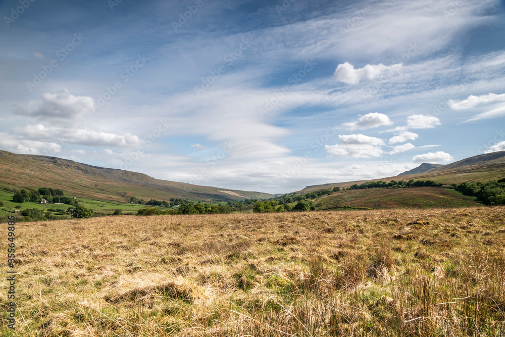 A summer three images HDR picture of Wild Boar Fell, in the Yorkshire Dales National Park, taken from Wharton Fell in Cumbria