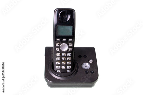 Old Of Black Office Phone With No Cord On White Background. Phone with buttons Isolated.