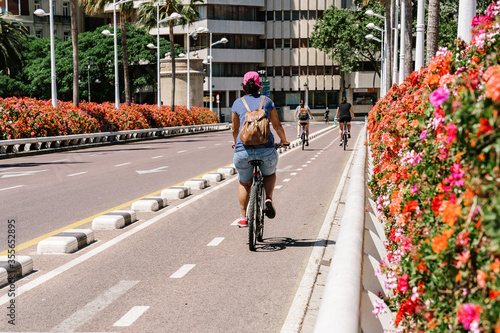 Photography Two-way bike path by the Pont de les flors in Valencia, Spain with urban cyclists