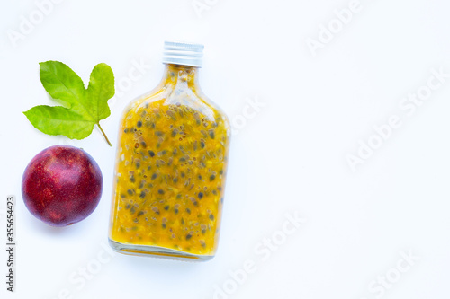 Passion fruit juice on white background.