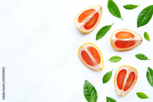 Fototapeta Naklejka Na Ścianę i Meble -  High vitamin C. Juicy grapefruit slices on white.