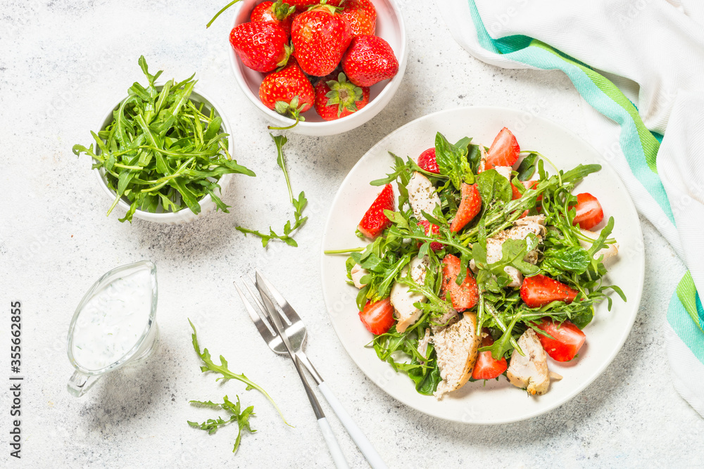 Green salad with chicken, strawberry and arugula. Green salad with chicken, strawberry and arugula.