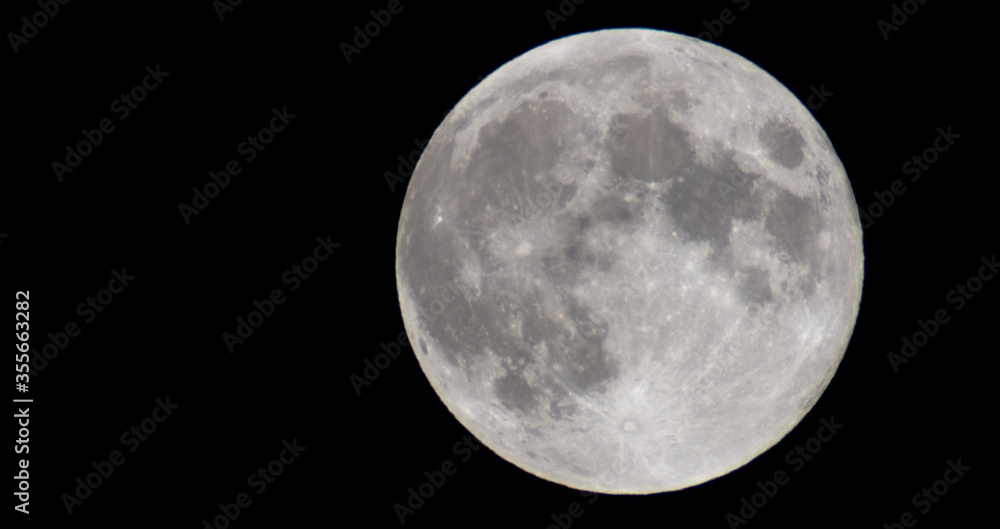 Fototapeta premium Full moon on black background