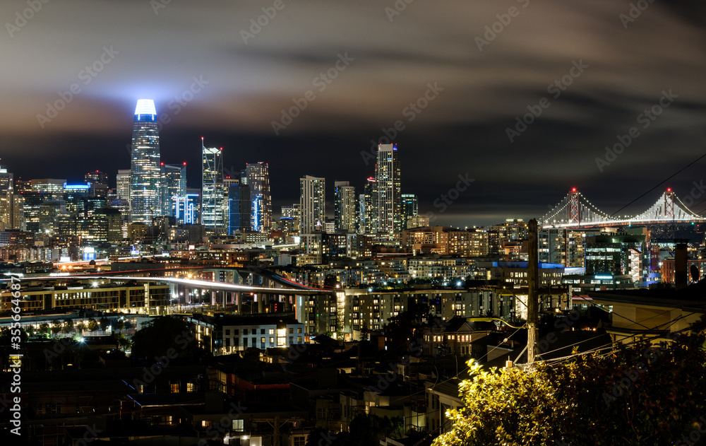 San Francisco California USA - August 17, 2019: San Francisco city skyline panorama at night viewed from Potrero Hill on the crossing of Texas street and 19th street