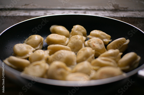 frying pan with dumplings