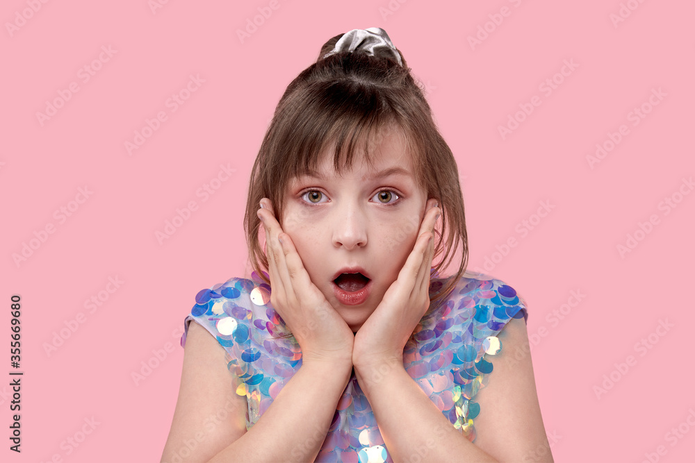 Close up portrait of a scared and anxious young girl, with eyes wide open Close up portrait of a scared and anxious young girl, with eyes wide open