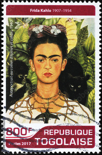 Obraz na płótnie Self-portrait with animals by Frida Kahlo on stamp